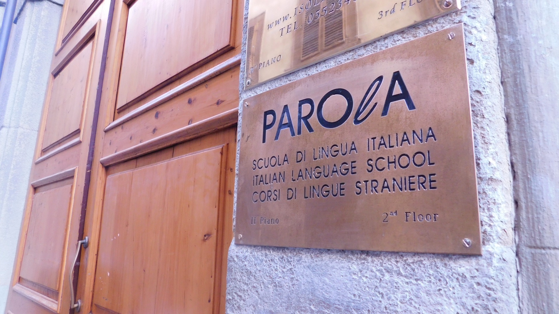 Parola school sign in Borgo Santa Croce, 4 in Florence